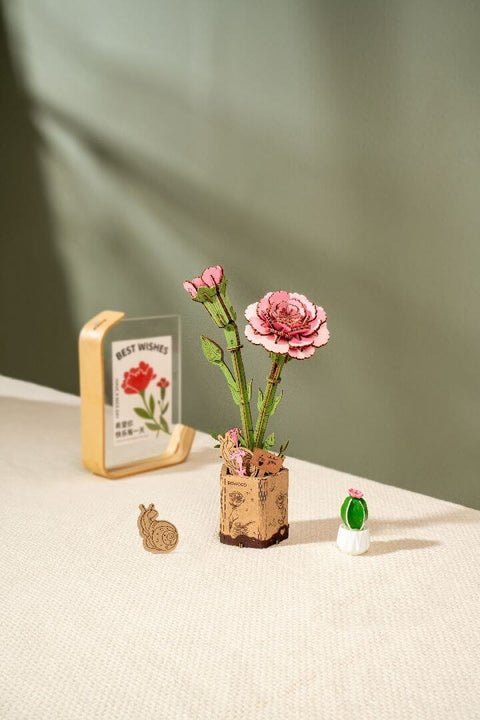 A Wooden Pink Carnation 3D Wooden Puzzle priced at $9.99 available from Echelon Hobbies